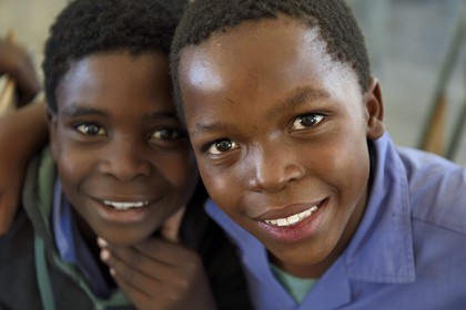 Namibia, Erongo region, Damaraland, the Spitzkoppe in the Namib Desert, Katora Primary School, boys in the grade 4 classroom (around 11 years)