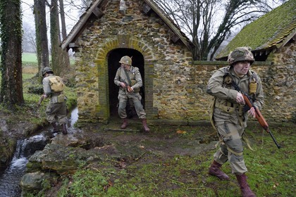 France, Eure, old wash-house of Sainte Colombe prés Vernon, Allied Reconstitution Group (US World War 2 and french Maquis historical reconstruction Association), reenactors in uniform of the 101st US Airborne Division