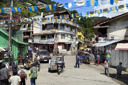 Philippines, Ifugao province, Banaue town, tricycle motorcycle taxi on the main square