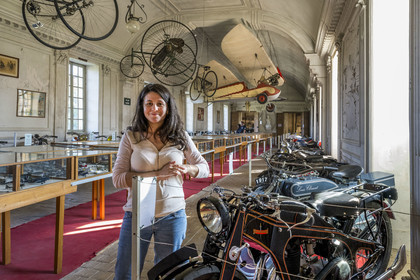 France, Cote d'Or, Côte de Beaune, Savigny-les-Beaune, the castle with museums and collections of fighter planes, Abarth racing cars, motorcycles, straddle tractors, models, fire trucks, Marie Pont poses with the Durandal motorcycle (1937), the first motorcycle collected by her great-grandfather