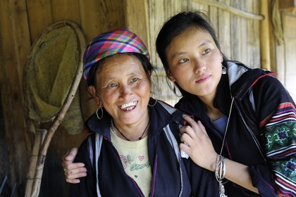 Vietnam, Lao Cai province, Sapa district, young woman from the Black Hmong minority group with her mother