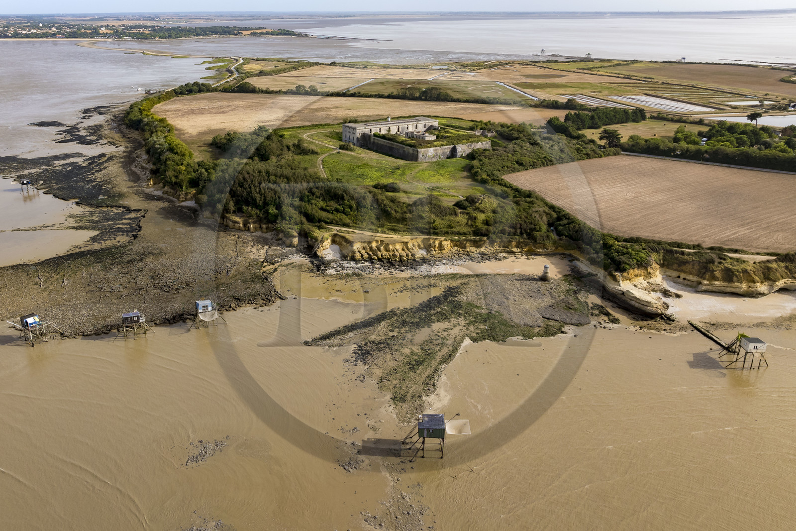 France, Charente Maritime, Port des Barques, Ile Madame, the fort built in 1703, the Insurgent Well and huts on stilts called carrelets at rising tide (aerial view)