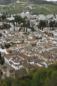 Spain, Andalusia, Granada, Albaicin District listed as World Heritage by UNESCO from the Alhambra, in the background the gypsy quarter and city walls