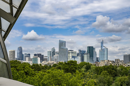 France, Paris, the buildings of La Défense from the Louis Vuitton Foundation by architect Frank Gehry in the Bois de Boulogne