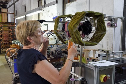 France, Var, Presqu'ile de Saint Tropez, Cogolin, the Manufacture Cogolin has been making rugs since 1924, most of them are woven by length on 19th century Jacquard hand looms, setting up the skein