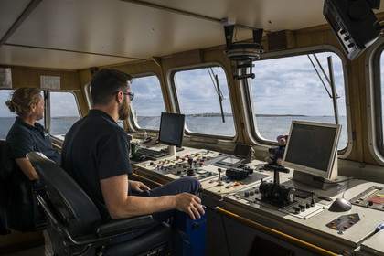 France, Finistère, Iroise Sea, Molene Island, Penn ar Bed boat connecting with the islands of Molene and Ouessant, arrival on the Island of Molène seen from the bridge with the pilot