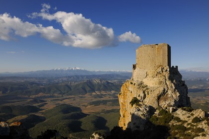 France, Aude, Cathar castle of Queribus, in front of Maury plain and the mount Canigou (2784 m) in the Pyrenees