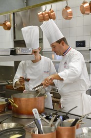 France, Rhone, Collonges au Mont d'Or, Paul Bocuse Restaurant L'Auberge du Pont de Collonges, three Michelin stars since 1965, the Paul Bocuse kitchen brigade run by chef Christophe Muller at work