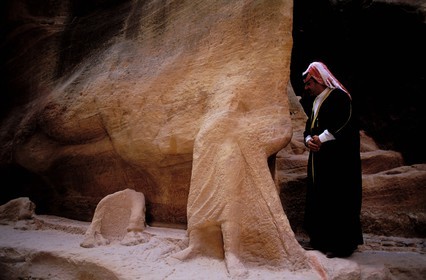 Jordan, Petra, camel driver' life size sculpture with his animal in the Wadi Mousa sîq (discovered 1988)