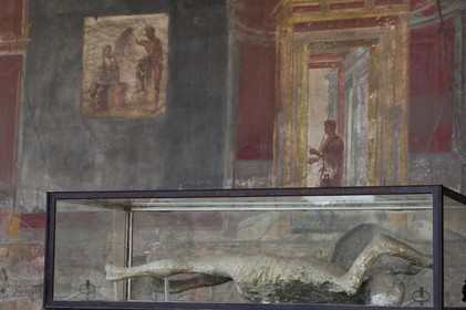 Italy, Campania, Pompei, archeological site listed as World Heritage by UNESCO, fresco and cast of prints of victims of the eruption