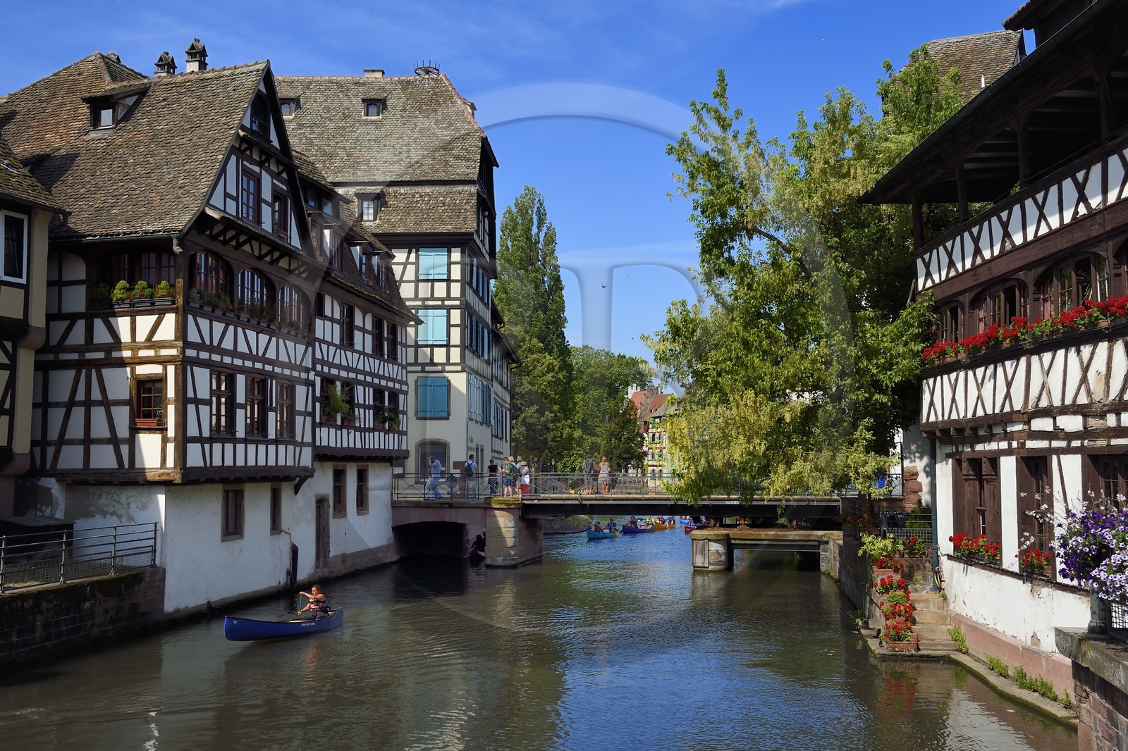 France, Bas Rhin, Strasbourg, old town listed as World Heritage by UNESCO, Petite France District, the Pont du Faisan on the Ill river and the Maison des Tanneurs from 1572 (restaurant) on the right France, Bas Rhin, Strasbourg, old town listed as World Heritage by UNESCO, Petite France District, the Pont du Faisan on the Ill river and the Maison des Tanneurs from 1572 (restaurant) on the right