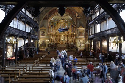 France, Pyrenees Atlantiques, Basque Country, Saint Jean de Luz, the Saint-Jean-Baptiste (Saint John the Baptist) Church, 17th century altarpiece in gilded wood and the wooden galleries of the nave