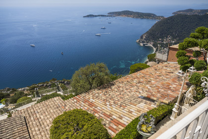 France, Alpes-Maritimes, the hilltop village of Eze, view of the coast from the hotel and restaurant of the Chateau de la Chèvre d'or, the peninsula of Saint-Jean-Cap-Ferrat in the background
