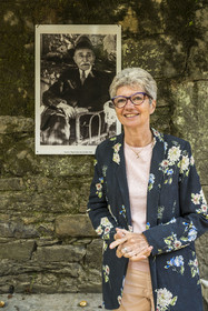 France, Gard, Generargues towards Anduze, Bambouseraie en Cévennes (Bamboo garden), President and Director Muriel Nègre, her grandfather Gaston Nègre in the background is at the origin of the revival of the site in 1902