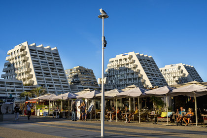 France, Herault, La Grande-Motte, labeled 20th century heritage, Levant (rising sun) district east of the port, Café terraces on Place Diana not far from Point Zéro