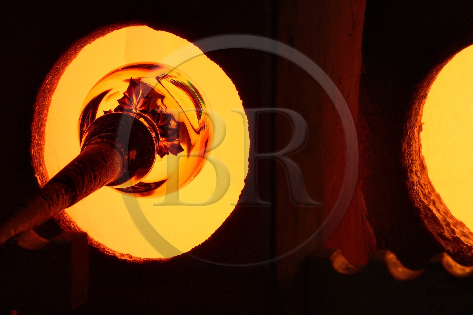 France, Moselle, Saint-Louis-les-Bitche, the Cristallerie Saint-Louis (Saint-Louis crystal glass manufacturer), shaping a hot crystal element, one of the many steps of the realization of a paperweight