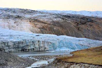 Greenland, central western region towards Kangerlussuaq bay, Isunngua highland, the Reindeer glacier (part of the Russell Glacier) at the edge of the ice cap and located within the UNESCO World Heritage site of Aasivissuit - Nipisat and hiker
