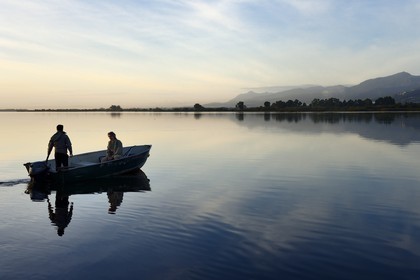 France, Haute Corse, the pond of Biguglia (Stagnu di Chiurlinu) at dawn, nature reserve of Corsica (RNC), Paul-Marie Ghipponi guard of the natural reserve of Corsica (RNC) patrolling the pond
