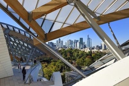 France, Paris, Louis Vuitton Foundation by architect Frank Gehry and La Defense in the background