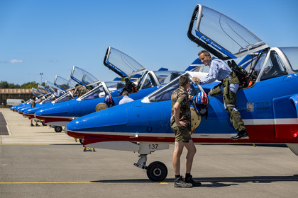 France, Bouches du Rhone, Salon de Provence, air base 701, base of the Patrouille de France (PAF for Patrouille acrobatique de France) of the French Air and Space Force, the pilot, Captain Cédric Queyranne, finishes preparing alongside adjudant Nicolas Renard, his mechanic, for a flight aboard his Alphajet aircraft