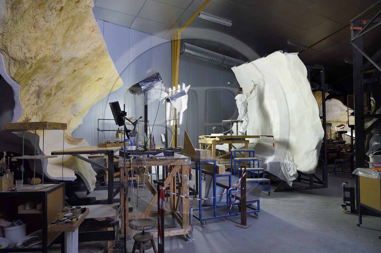 France, Dordogne, Montignac, the Atelier des Fac-Similés du Périgord (Perigord's Facsimile Workshop AFSP) specialised in mineral reproduction of prehistoric painted walls using “stone veil” patented technique and in charge of the Lascaux cave’s walls faithfull reconstitution, Stone veil projection on the structure, compulsory mention Atelier des Fac-Similés du Perigord