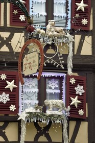 France, Haut Rhin, Colmar, wood-framed houses in Rue des Marchands with Christmas decorations