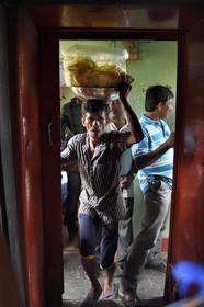 Sri Lanka, Western Province, train from Galle to Colombo, street vendor traveling in wagons