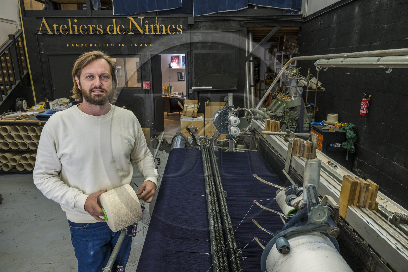 France, Gard (30), Nimes, Guillaume Sagot, fondateur de l’Atelier de Nîmes qui a relancé la fabrication de toiles de jean traditionnelles