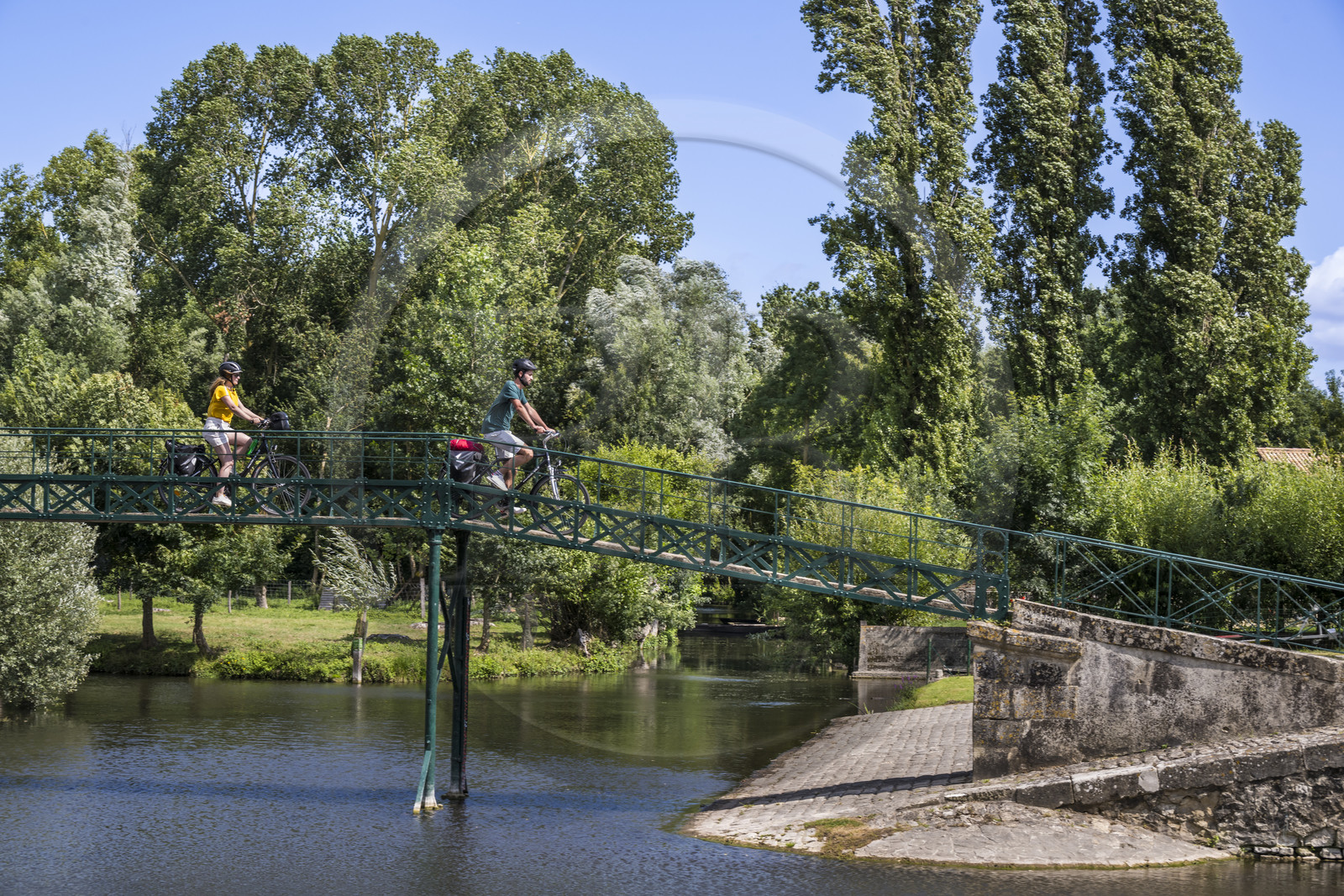 France, Deux-Sèvres, le Marais Poitevin, Green Venice, Le Vanneau-Irleau, bicycle journey along the canals and crossing a footbridge