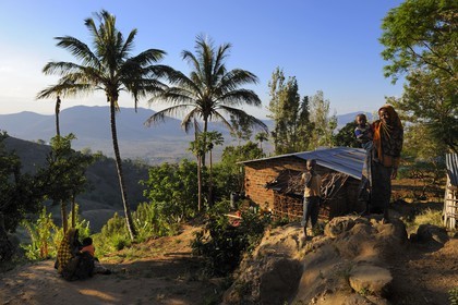 Tanzania, Morogoro district, Uluguru mountains, young girl carrying a child in a village around the former german refuge called Morningside
