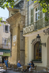 France, Bouches du Rhone, Arles, columns of Saint Lucian, half-pediment and two Corinthian capitals, the only remains of a small temple (2nd century) of the ancient Roman forum on the current place du Forum, listed as World heritage by UNESCO