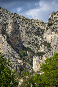 France, Alpes de Haute Provence, Parc Naturel Régional du Verdon, village of Moustiers Sainte Marie, labelled Les Plus Beaux Villages de France (The Most Beautiful Villages of France), Notre Dame de Beauvoir chapel in the cliffs