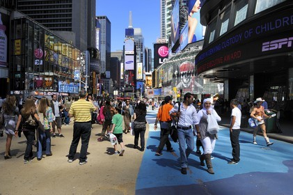 United States, New York, Manhattan, Midtown, Times Square, pedestrian and cyclist part of Broadway, on the right the Naked Cowboy is a well known local tourist attraction