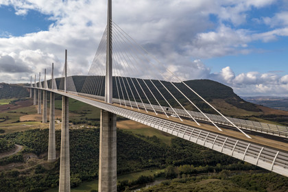 France, Aveyron, Grands Causses regional natural park, Millau, the Millau viaduct by architects Michel Virlogeux and Norman Foster, between the Causse du Larzac and the Causse de Sauveterre above the Tarn river (aerial view)
