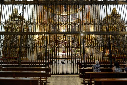 Spain, Extremadura, Guadalupe, Royal Monastery of Santa Maria de Guadalupe listed as World Heritage by UNESCO, grid protecting the altarpiece of the sanctuary