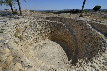Israel, Northern District, Galileo, archaeological site of Megiddo which was inhabited from 7000 to 500 BCE, the Apocalypse of the Apostle John quotes Armageddon (Har Megiddo, the Mount Megiddo) as the place where the kings of the earth gather to make the final war, public grain silo from the time of King Jeroboam II (8th century BCE)