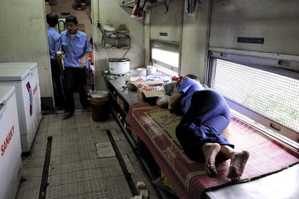 Vietnam, day train from Lao Cai to Hanoi, the restaurant carriage, the kitchen gets a restroom