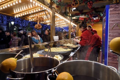 France, Bas Rhin, Strasbourg, old town listed as World Heritage by UNESCO, Christmas market (Christkindelsmarik) on the place Broglie, hot spiced wine stand and Sauerkraut