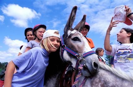 France, Gers, Donkey riding in la Ferme de L'Ange