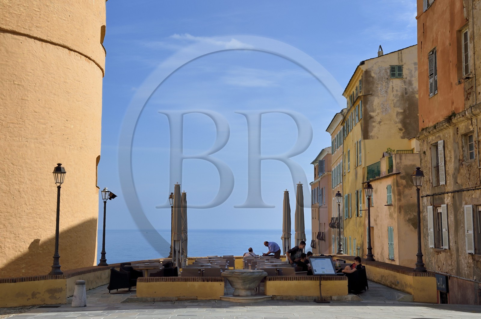 France, Haute Corse, Bastia, the Citadel district of Terra Nova, the palace of the Genoese governors that hosts the Musee d'Histoire de Bastia (Museum of Bastia History) left, Restaurant terrace on the Dungeon place