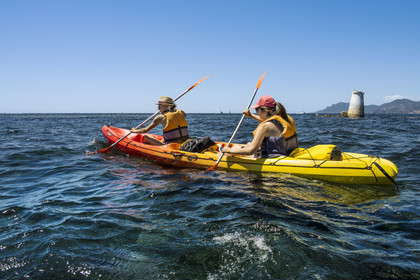 France, Alpes-Maritimes, Cannes, kayaking in the Lerins Islands, passage between Cap de la Croisette and Ile Sainte-Marguerite, the Esterel mountains in the background right