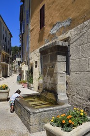 France, Alpes de Haute Provence, Annot, fountain at the entrance of the old village