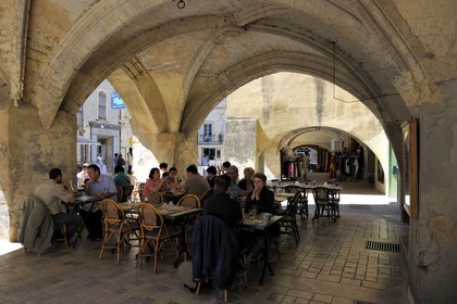 France, Gard, Uzes, restaurant under the arcades of the place Dampmartin