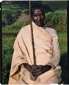 Burundi, Bujumbura Province, Ijenda area, Tutsi man, he shows his membership in the notable class (Abashingatahe) including wearing his clothing and a shepherd's staff, once the garment was made of beaten wood bark (4x5 reversal film reproduction)