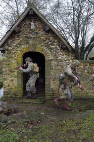 France, Eure, old wash-house of Sainte Colombe prés Vernon, Allied Reconstitution Group (US World War 2 and french Maquis historical reconstruction Association), reenactors in uniform of the 101st US Airborne Division