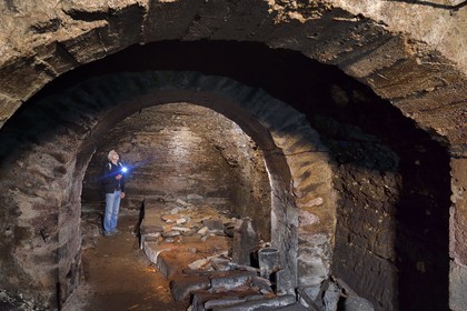 France, Puy de Dome, Clermont Ferrand, René Ribeyre member of the ACAVIC association (Amis des Caves du Vieux Clermont) in the galleries dug in the basements in tuff of the Conservatory (former Lycée Blaise Pascal)