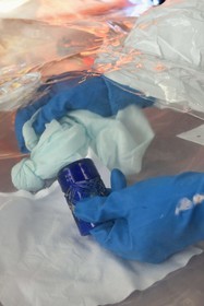 France, Bas-Rhin, Schiltigheim, intervention of engineers from the National Agency for the Management of Radioactive Waste (Andra) in a private home to remove radioactivity from a rare model of a century-old radium fountain, decontamination of the glass by friction