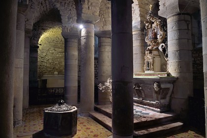 France, Puy de Dome, Clermont Ferrand, Notre-Dame-du-Port basilica in Auvergne Romanesque style, listed as a UNESCO World Heritage Site under the Routes of Saint-Jacques-de-Compostelle in France, the crypt which houses the Black Madonna on her altar as well as a very old well