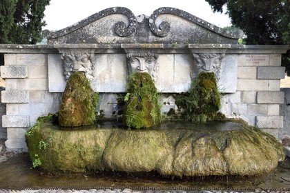 France, Vaucluse, Parc Naturel Regional du Luberon (Natural Regional Park of Luberon), Lourmarin, labelled Les Plus Beaux Villages de France (The Most Beautiful Villages of France), three masks fountain