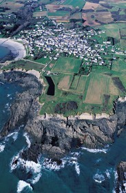 France, Morbihan, Groix island, Locmaria on the South coast and a ship wreck (aerial view)